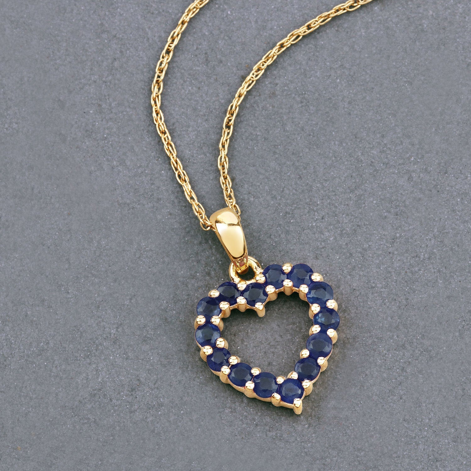 0.64 Carat Genuine Blue Sapphire 10K Yellow Gold Pendant