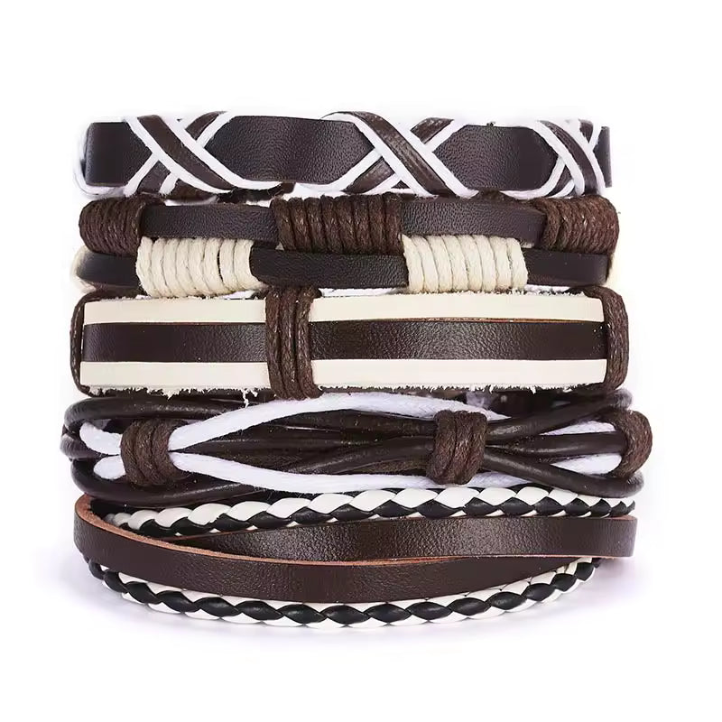 Stack of leather bracelets with braided patterns on a white background