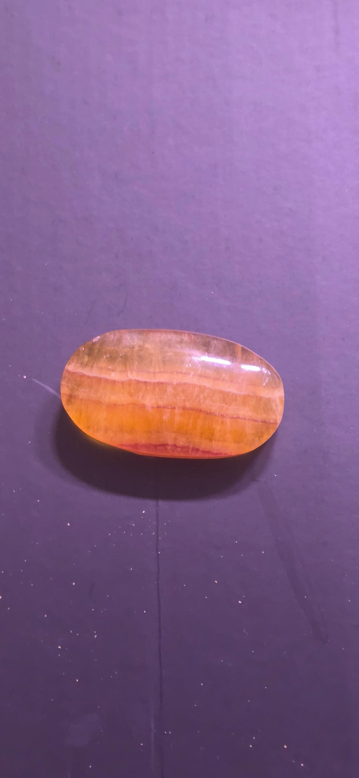 Orange Calcite Palm Stone - Image 1