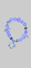 Purple beaded bracelet with butterfly charms on a light gray background