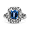 .925 Sterling Silver Diamond Accent and 8X6 mm Emerald-Shape Blue Topaz Ring (I-J Color, I2-I3 Clarity) - Ring Size 7