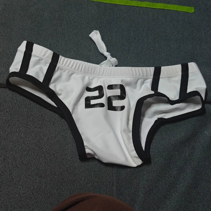 2026 Fashion Low waist triangle swimming trunks men's quick-drying lake-up Japanese tight beach tan white swimming trunks 220903