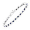 6.87 ct. t.w. Blue Sapphire and White Topaz Bracelet in Sterling Silver